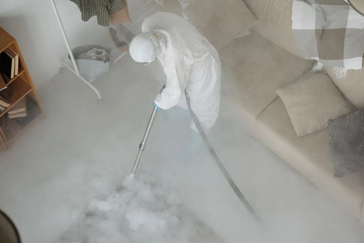 Biohazard cleanup technician in protective equipment, Flat Rock, MI